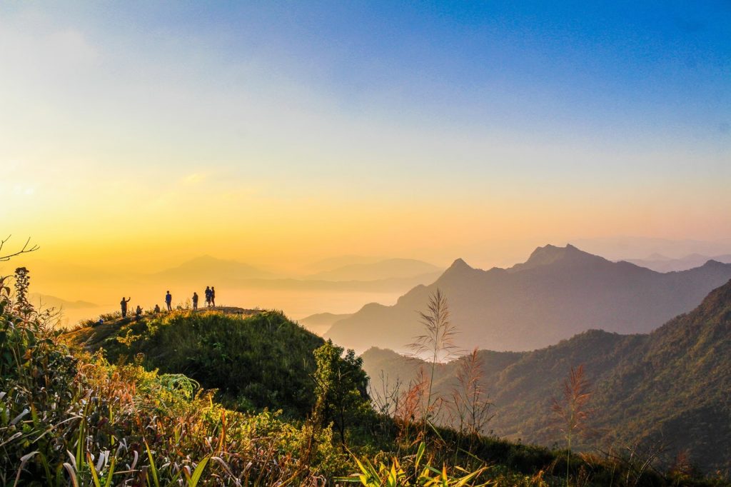 Koulutukset Photo Of People Standing On Top Of Mountain Near Grasses 733162 1024x682 1